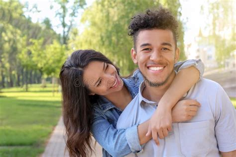 Happy African American Couple In Park On Spring Day Stock Photo Image