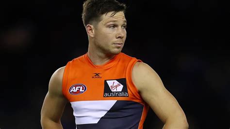 Maybe you would like to learn more about one of these? Toby Greene kick beer poured over head Luke Dahlhaus GWS ...