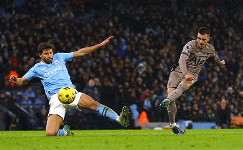 man city held again in six goal spurs thriller liverpool move second