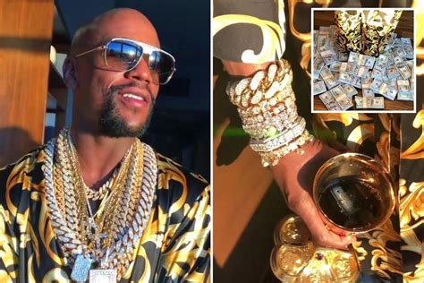 Floyd Mayweather Flaunts Wealth By Standing In Pile Of Money Drinking From Gold Goblet While