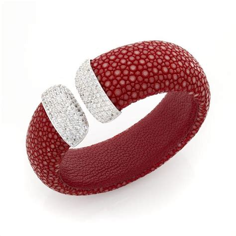 This may then be followed by skin peeling. Red Stingray Skin Cuff with White Sapphire and White ...