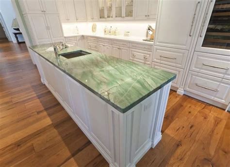 Similar to quartz, quartzite is durable and will last long after installation. Green marbled quartzite for a beautiful traditional ...