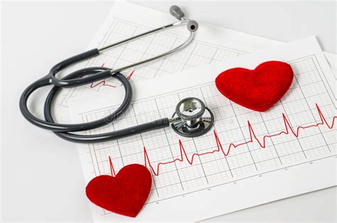 Stethoscope And Two Red Heart On Electrocardiogram Stock Image Image