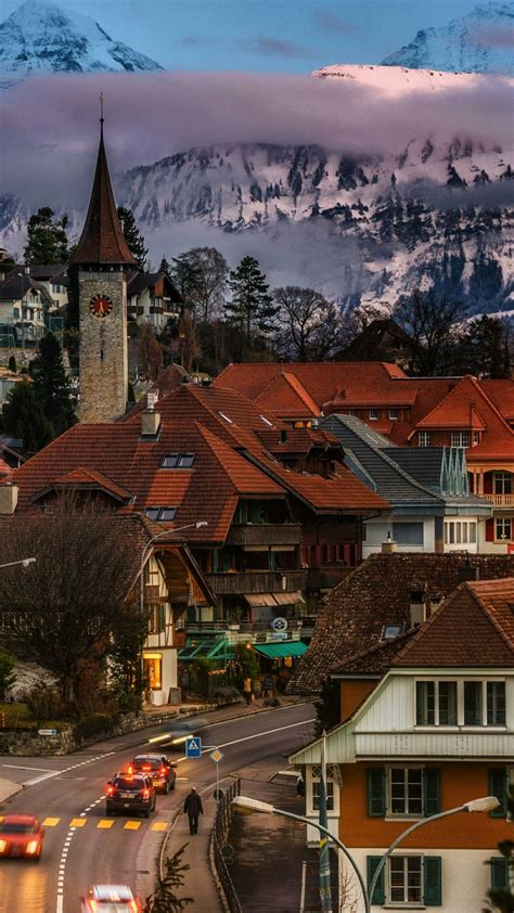 Town In The Swiss Alps Wallpaper Backiee