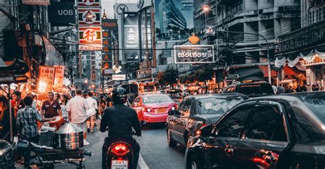 Crowded Street With Cars Passing By · Free Stock Photo