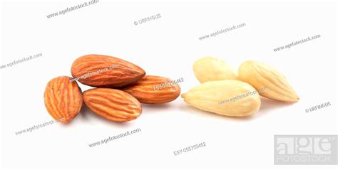 Two Handfuls Of Almonds On A White Background Stock Photo Picture And