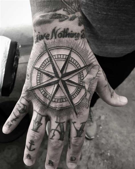 Best 24 compass tattoos design idea for men and women. A compass by Kristi Walls | Hand tattoos for guys, Hand ...
