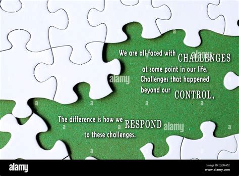 Motivational quote on white jigsaw puzzle with some missing pieces on