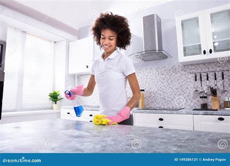 African Woman Cleaning Kitchen Counter Stock Image Image Of Afro