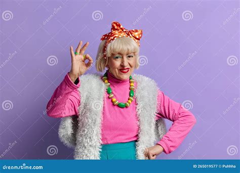 happy granny showing ok sign mature lady showing okay sign stock image image of aging woman