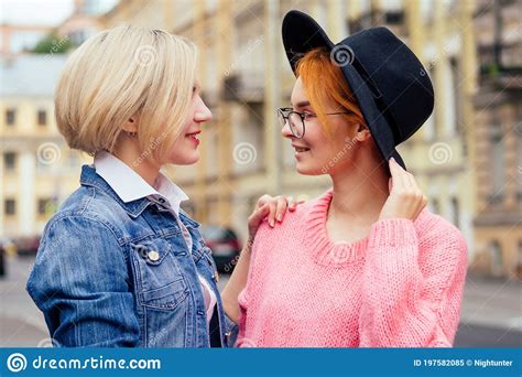 two cheerful same sex people in love walking outdoors in europe stock image image of freedom
