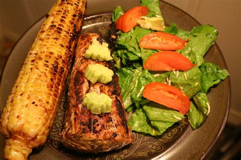 The best temp to cook tuna steak on grill is medium high heat, so get your grill preheating while you prepare the tuna steaks with your marinade or seasoning. Grilled Ahi Tuna Steaks with Pesto Butter -spatialdrift