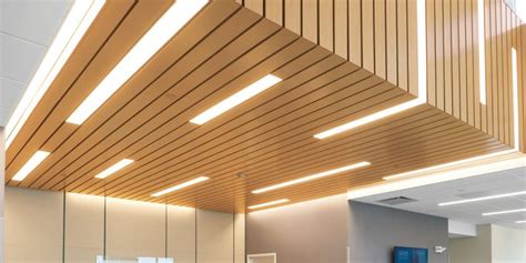 In larger spaces, this linear ceiling system can be combined with bandrasters. Linear Ceilings | Armstrong Ceiling Solutions - Commercial