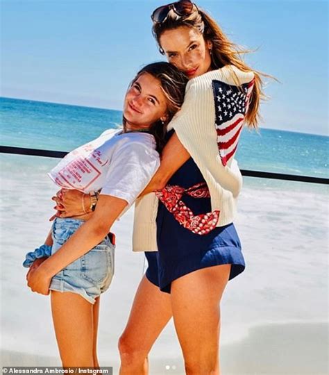 Alessandra Ambrosio Cuddles Up To Lookalike Daughter Anja Daily Mail