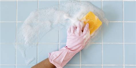 To clean dirty grout between the tiles, make a paste with baking soda and water, apply it to the grout, and allow it to sit overnight. How to clean a shower