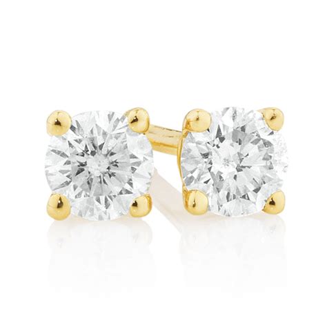 Stud Earrings With 1 4 Carat TW Of Diamonds In 10ct Yellow Gold