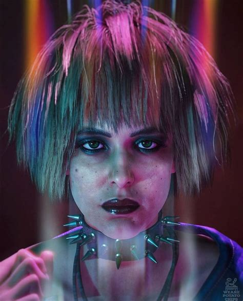 A Woman With Short Hair And Piercings On Her Face Is Shown In Neon Lights