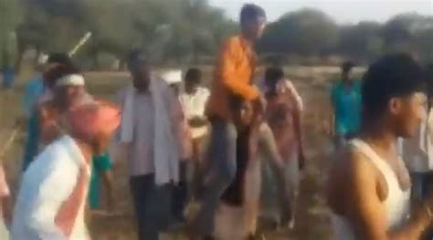 watch woman forced to carry husband as ‘punishment for alleged affair with man outside her