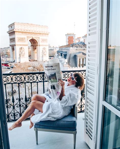 Girl On The Balcony Of The Hotel At Champs Elysees Reading Newspaper In Paris Good Morning From