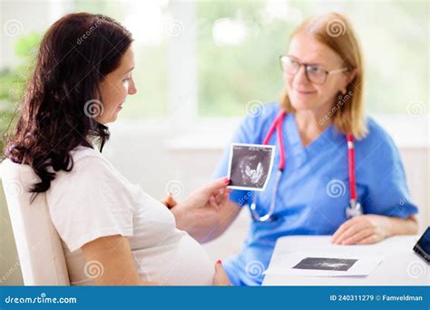 Asian Gynecologist Examining Patient In Hospital Using A Colposcope Stock Image Cartoondealer