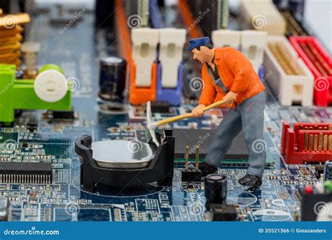 Computer Board And Construction Workers Royalty Free Stock Image