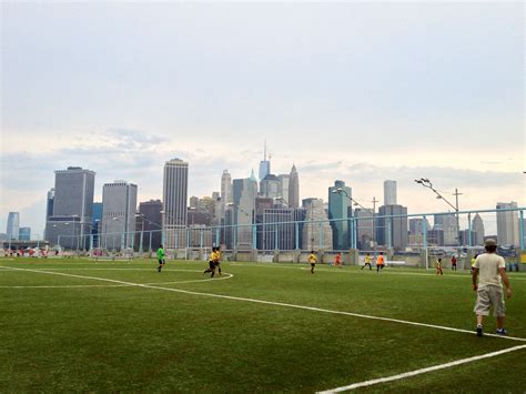 Soccer Fields At Brooklyn Bridge Park With A View Of The City Nyc
