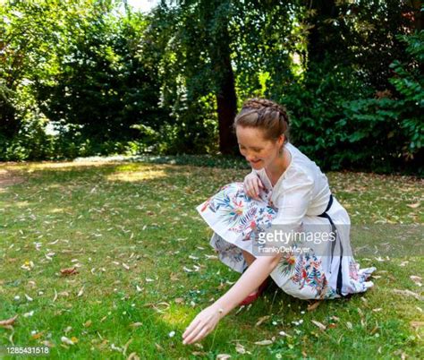 Girl Kneeling Down Photos And Premium High Res Pictures Getty Images