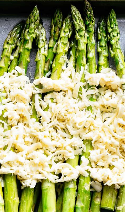 Snap the bottom inch off each of the asparagus stalks (or slice with a knife if desired). Garlic Roasted Cheesy Sheet Pan Asparagus (With images ...