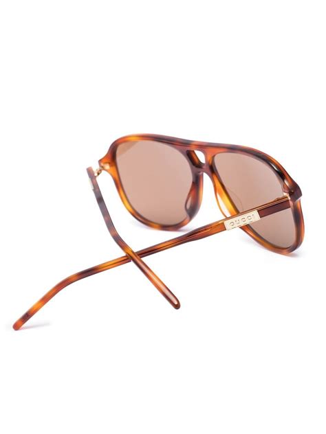 gucci eyewear tortoiseshell effect pilot frame sunglasses farfetch
