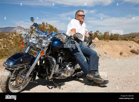 Senior Man Leaning Motorcycle Desert Road Stock Photo Alamy