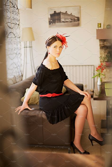 Woman Sitting On Sofa In Cafe Beauty And Fashion Stock Photos