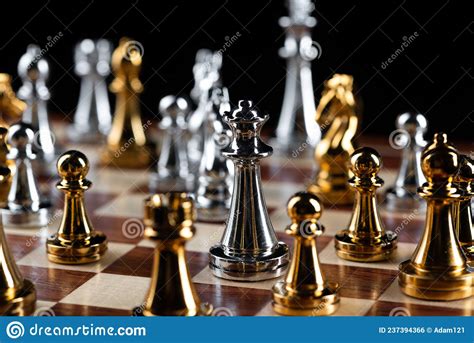Gold And Silver Chess Figures On Chessboard Stock Photo Image Of