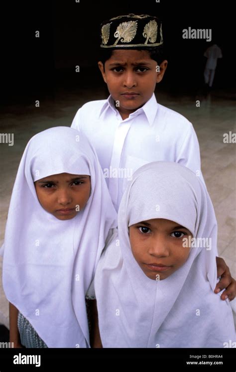 Three Muslim Children In Traditional Costume The Maldives Stock Photo