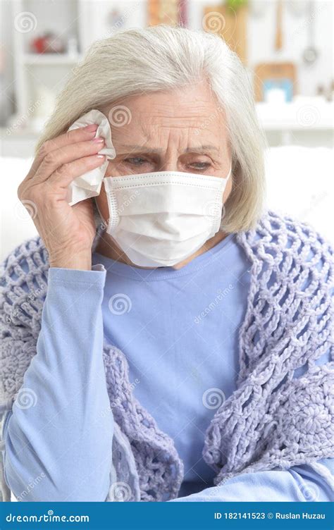 portrait of ill beautiful senior woman with facial mask stock image image of person pose