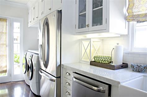 Getting approval to add a washer/dryer. Washer And Dryer In Kitchen Design Ideas