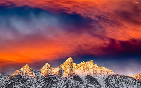 Breathtaking Sunset Over The Mountain Peaks Wallpaper Nature