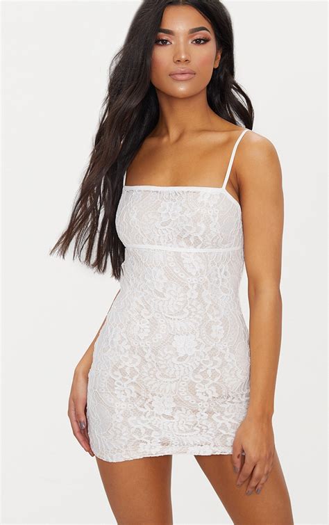 white lace bodycon dress with nude lining prettylittlething