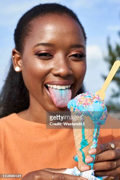 Licking Ice Cream Cone Photos And Premium High Res Pictures Getty Images