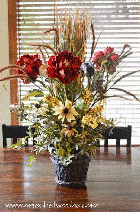 I decided to use three mason jars for this project, so i needed three flower arrangements. DIY Silk Flower Arrangement Centerpiece (Saved Me $100 ...