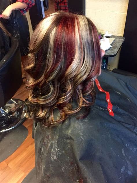 Brown Base With Blonde And Red Chunky Highlights Hair By