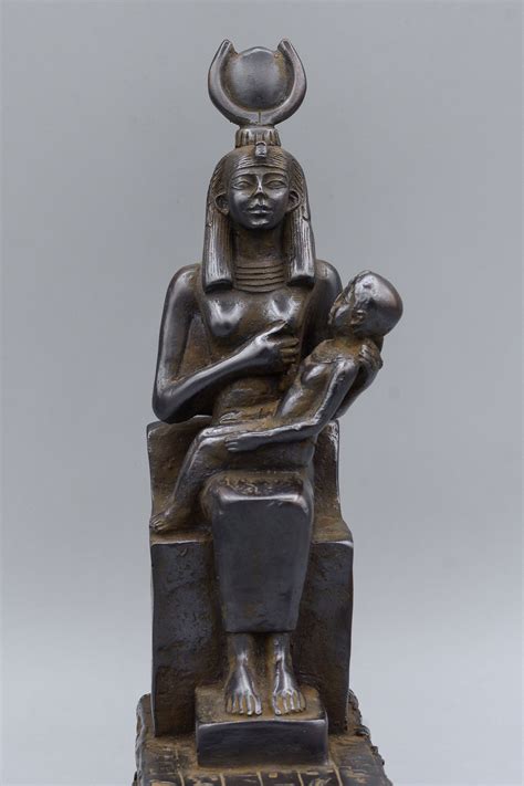 Ancient Egyptian Statue Of Goddess Isis Breastfeeds Her Son Horus Made