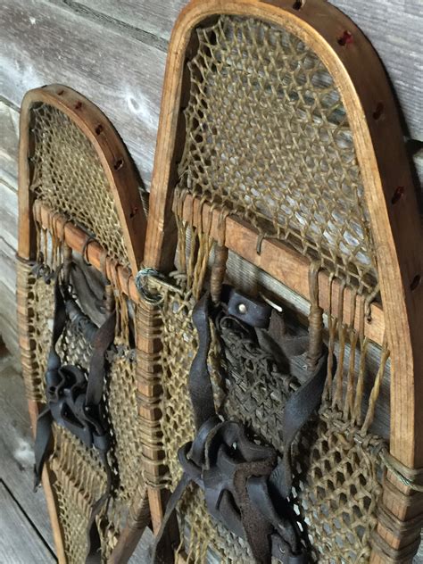 antique native american snowshoes with pom poms vintagewinter