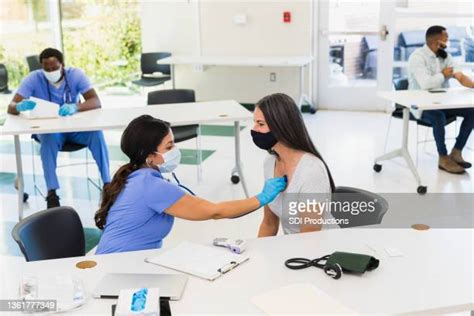 Nurse Checks Vital Signs Photos And Premium High Res Pictures Getty