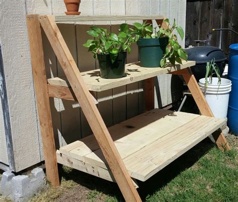 Outdoor plant stand made from pallets. | Outdoor plant stand, Outdoor plants, Outdoor decor