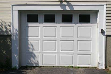 Attach the faux garage door windows to garage door panel with the stainless steel screws. A Guide to Repairing Garage Door Windows - Perfect ...