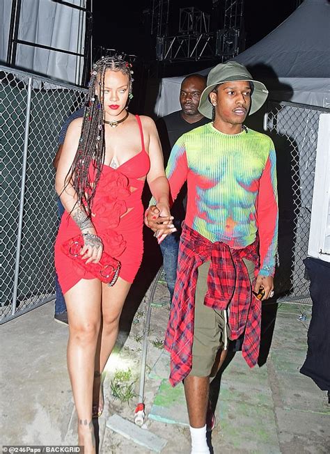 Rihanna Puts On A Busty Display In A Tight Red Minidress At Reggae Show In Her Native Barbados