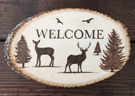 Fitting a stove in a shed or summerhouse needn't be complicated if a few basic rules are followed. Wood-burned welcome sign that I made. #deer #pinetrees ...