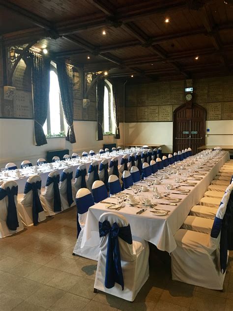 Get deals with coupon and discount code! Navy taffeta sashes on white chair covers with a hint of ...