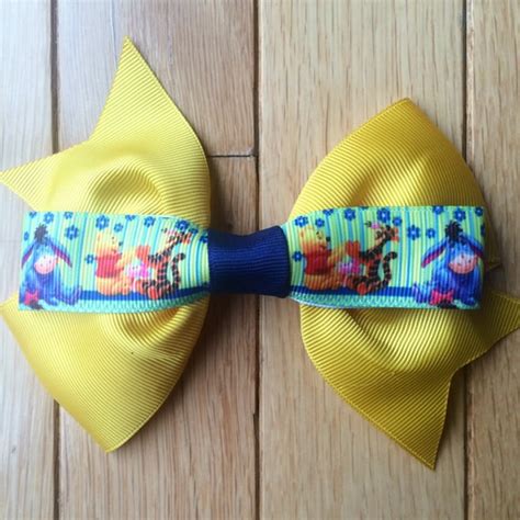 Items Similar To Winnie The Pooh Bow On Etsy