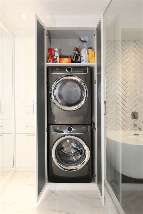 Wallpaper is perfect for tiny rooms, like a closet converted into a laundry space. Master Closet - Modern - Laundry Room - Toronto - by ...